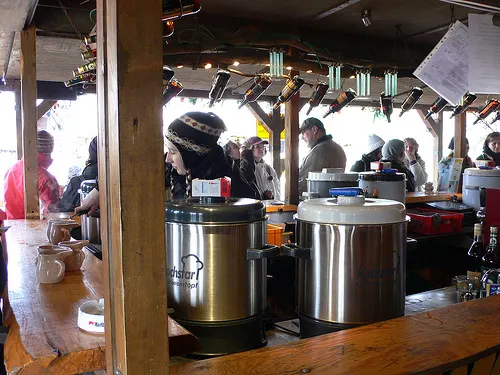 Serving Feuerzangenbowle at Tollwood Festival in Munich