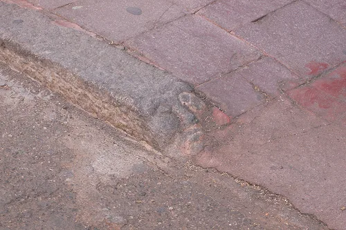 Carved kerb stones in Nuoro, Sardinia