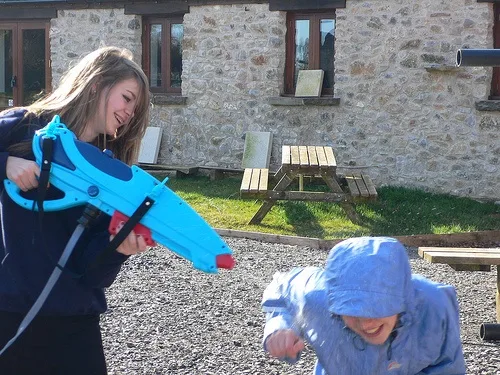 Water fights at Fernhill Farm Photo: Heatheronhertravels.com