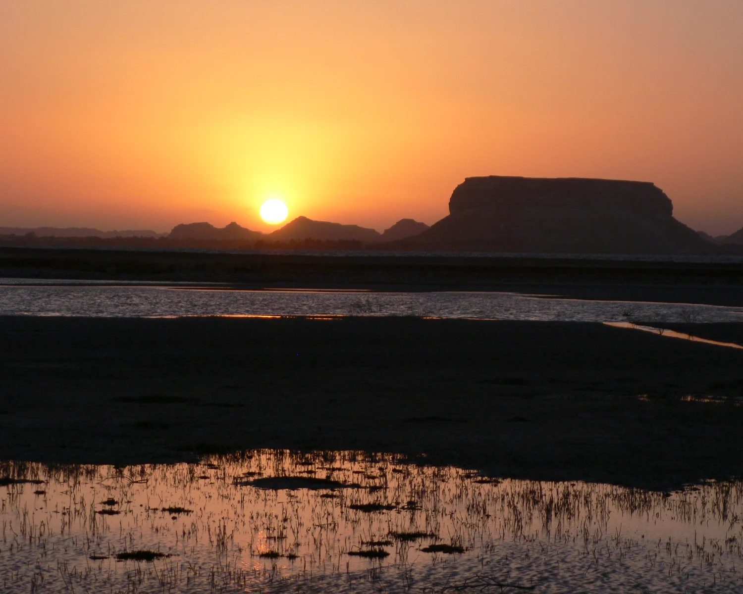 Sunset on Fatnas Island, Siwa in Egypt