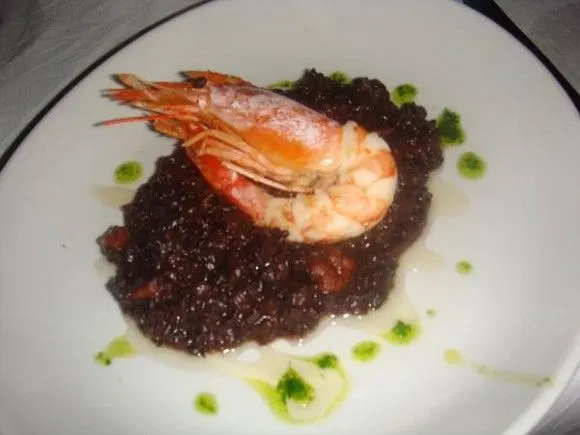 Prawn on black rice and honey sauce