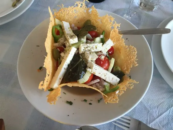 Azamara Pursuit - Greek salad on Santorini with Azamara Club Cruises Photo: Heatheronhertravels.com