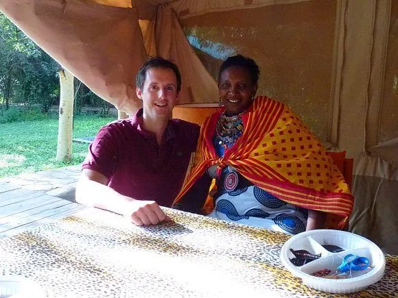 Mark with Mama Joyce and beads Photo: Audley Travel