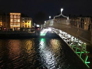 Halfpenny Bridge in Dublin at night Photo: Heatheronhertravels.com