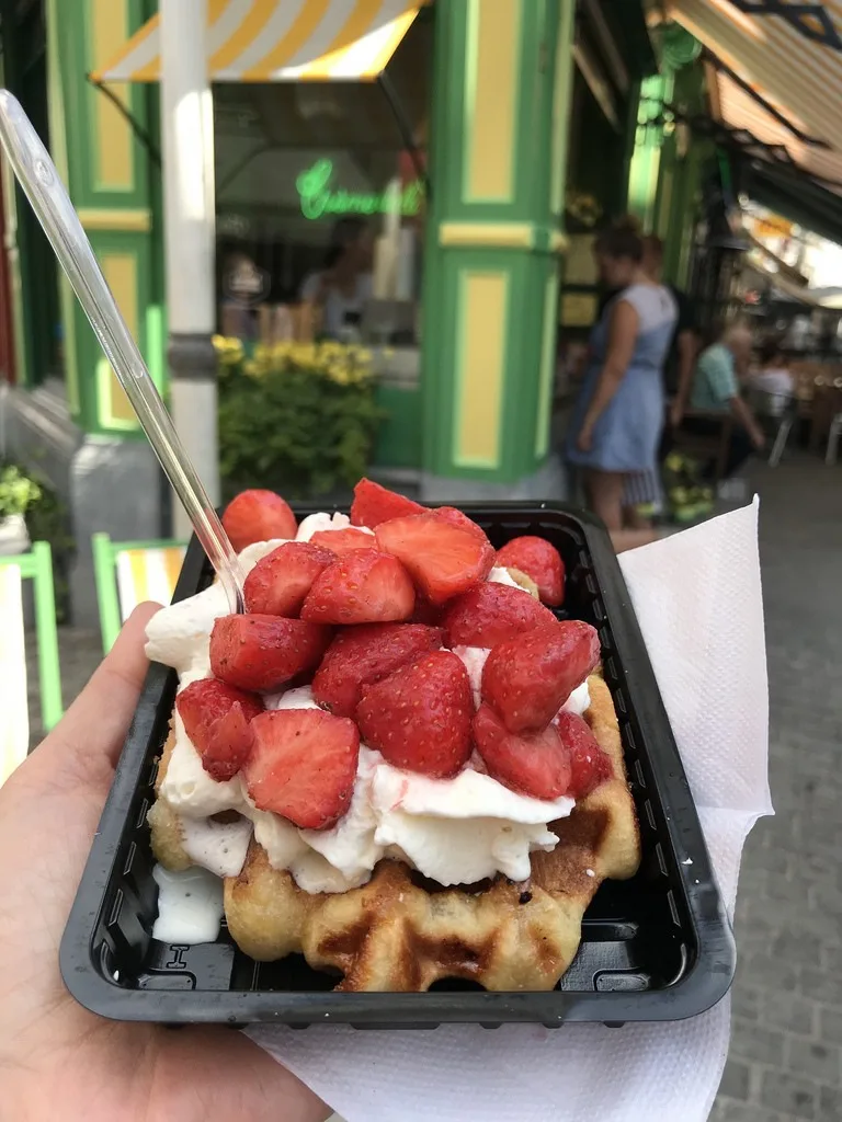 https://www.heatheronhertravels.com/wp-content/uploads/2018/12/Strawberry-waffles-in-Antwerp.jpg.webp