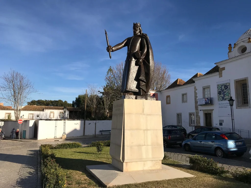 Faro things to see - King Alfonso statue Old Town Faro