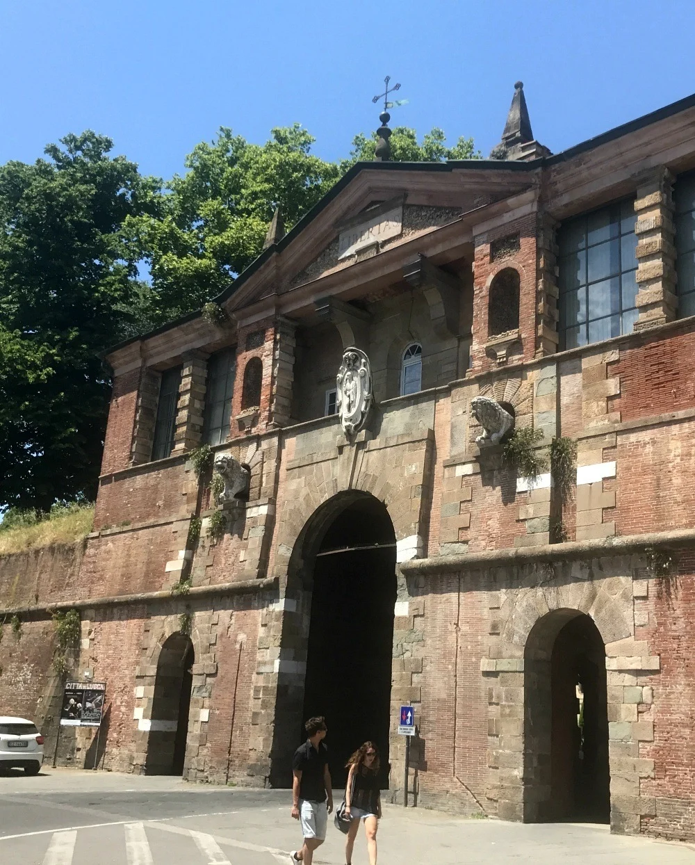 Gateway in the old city walls of Lucca, Italy Photo Heatheronhertravels.com