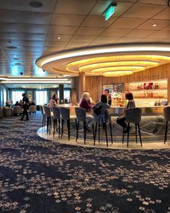 Atrium Bar on Norwegian Encore Photo Heatheronhertravels.com