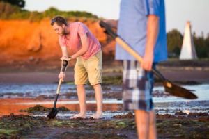 Clam digging in PEI Photo Credit: ©Tourism PEI / Carrie Gregory