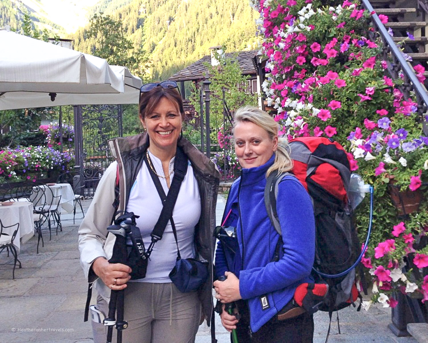 Heather and Julia Setting off on the Tour de Mont Blanc outside Hotel Villa Novecento, Courmayeur